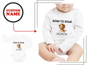 a baby's bodysuit with a picture of a lion on it