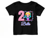 a little girl&#39;s birthday shirt with the number two on it