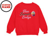 a red sweatshirt with a cupcake on it