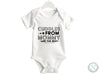 a white bodysuit with the words cuddles from mommy are the best