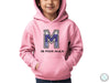 a young boy wearing a pink hoodie with the letter m on it