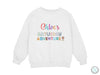 a white sweatshirt with the words child&#39;s saturday adventure printed on it