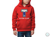 a young boy wearing a red hoodie with the letter t on it