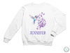 a white sweatshirt with a hummingbird and flowers on it