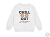 a white sweatshirt with the words chill out joseph printed on it