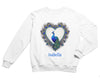 a white sweatshirt with a heart and a peacock on it